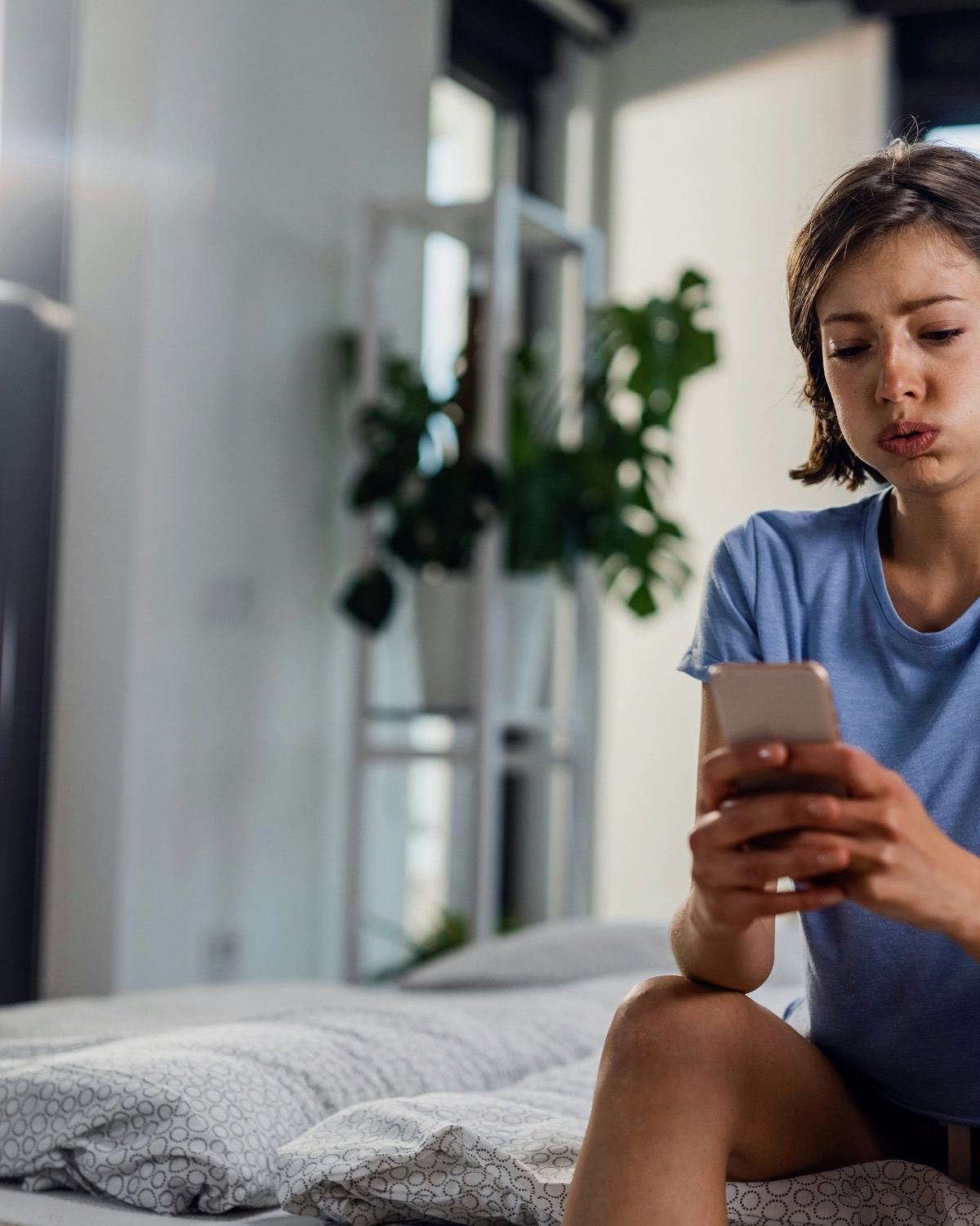 Person alone on phone